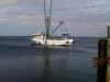Fishing boat heading out into the Gulf