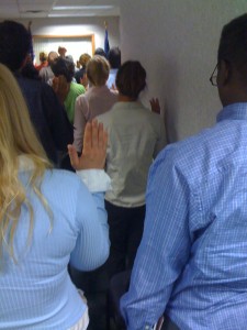 View from behind as Kathi becomes an American citizen